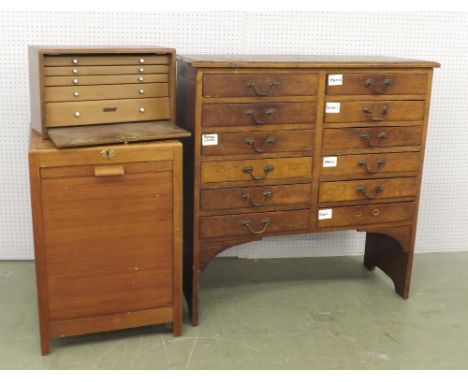 Wooden chest of twelve drawers, 37'' high, 15.25'' deep, 36.5'' wide (approx); together with a wooden cabinet of five drawers