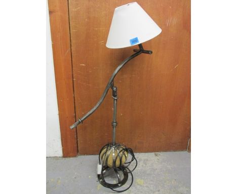 A modern iron angle poise table lamp