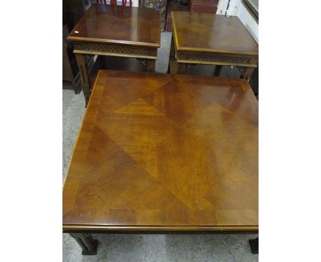 A pair of late 20th century American mahogany, two tier lamp tables with fretwork and a matching coffee table