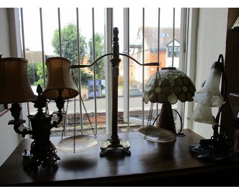 A brass scales of justice and mixed table lamps