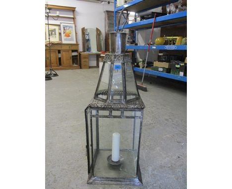 An iron and glass panelled lantern, 39h
