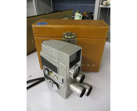A leather cased Revere Eye-Matic camera