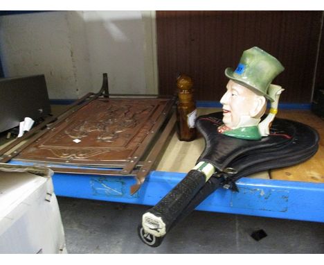 A pair of tennis rackets, a copper fireguard, a Beswick 'Title Deeds' character jug and an amber medicine bottle with lid