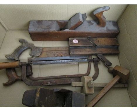 A small selection of vintage wood working tools to include planes and saws