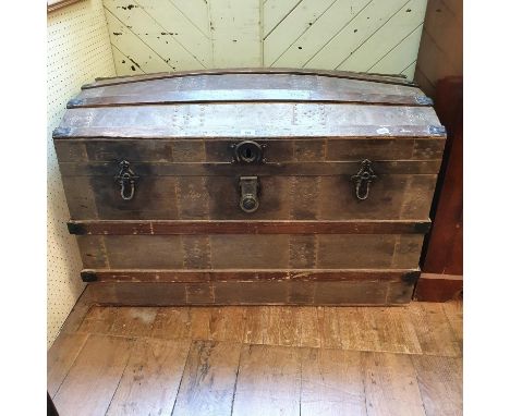 A dome topped travelling trunk, with a fitted interior, 103 cm wide

 