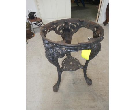 Cast iron decorated table base on tripod stand