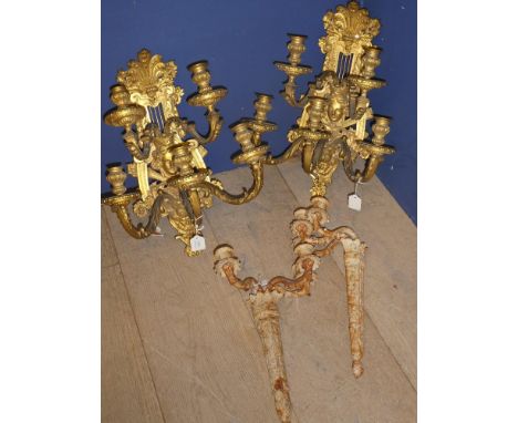 4 Wall sconces, 2 decorated in gilt with bearded man &amp; female faces, 5 light fittings on each 52L cm, 2 sconces weathered