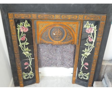 Stone fireplace Art Noveau style with tiled surround &amp; grate