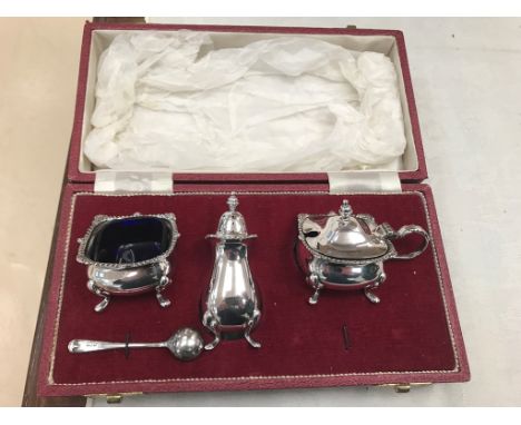 A boxed HM silver cruet set: maker's mark 'R & B'