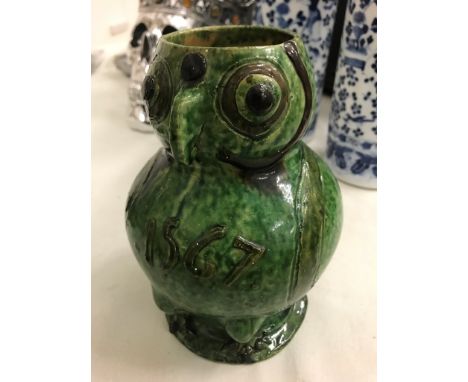 An early ceramic jug in the form of an owl