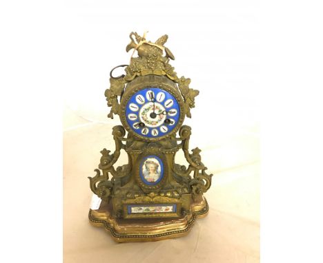 A Japy Freres mantel clock and stand: eight-day movement with Sevres-style plaques