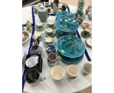 A quantity of ceramics to inc Poole, majolica comports, plates etc