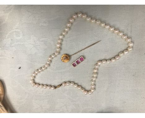 A 9ct clasped pearl necklace; together with a 9ct pendant and gold stick pin