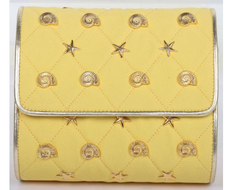 Escada Yellow and Gold Embellished Quilted Bag 
Add a touch of coastal charm to your collection with this stunning Vintage Es