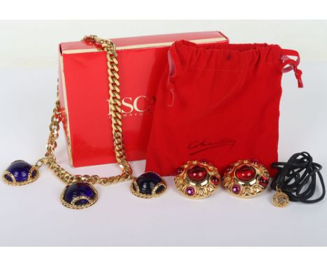 Escada Blue and Red Gem Stone Necklace and Earrings
Make a statement with this stunning Escada Blue and Red Gem Stone Necklac