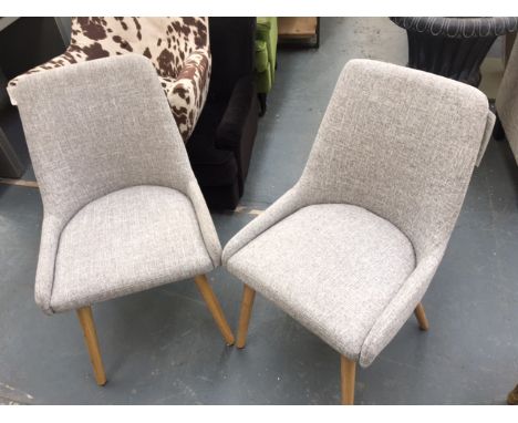 Two light grey fabric dining chairs: 