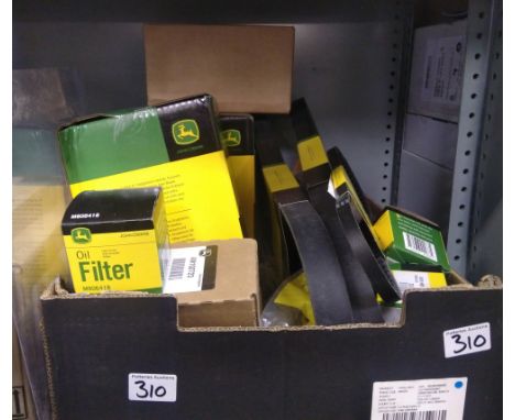 A large quntity of John Deere tractor parts: to include maintence packs, oil filters, belts etc 