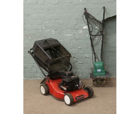 A petrol lawnmower with Briggs & Stratton engine along with an electric rotivator.