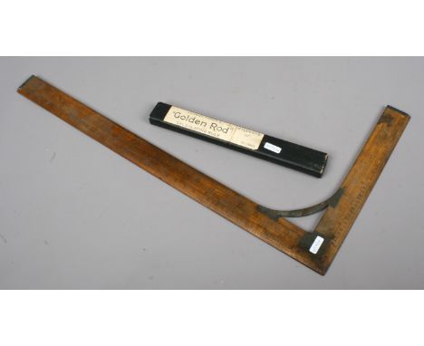A boxed Johan Faber golden rod calculating ruler and a vintage large set square by R Gill & Co Leeds.
