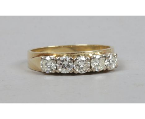 An 18ct gold five stone diamond ring, approximately 0.5ct total, size P.