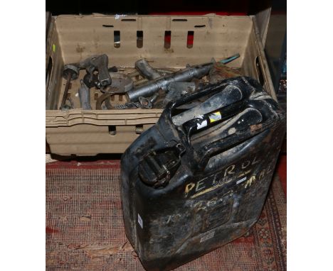 A box of old compressed air tools and a steel 20 litre jerry can.