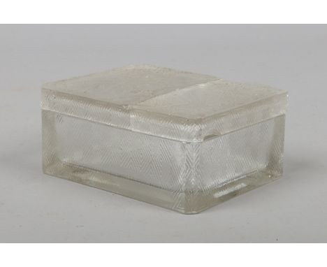 An Art Deco Rene Lalique cigarette box and cover moulded with flowers, signed R. Lalique. Cover (AF).