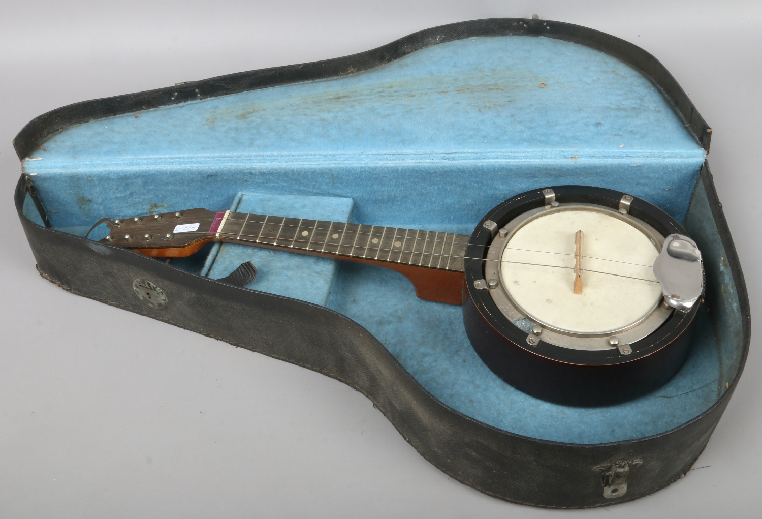A cased banjo mandolin by makers John Grey & Sons
