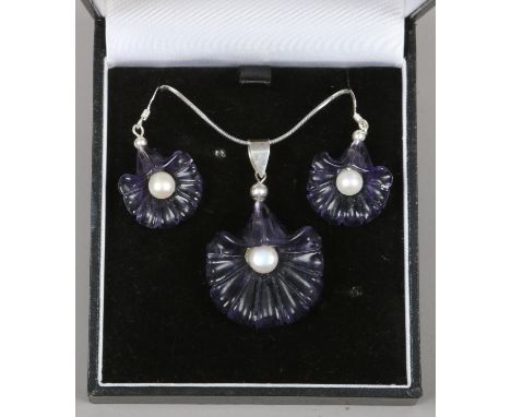 A suite of silver jewellery set with cultured pearls and amethyst glass.