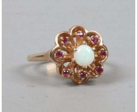 A 9ct gold opal and ruby ring size N1/2