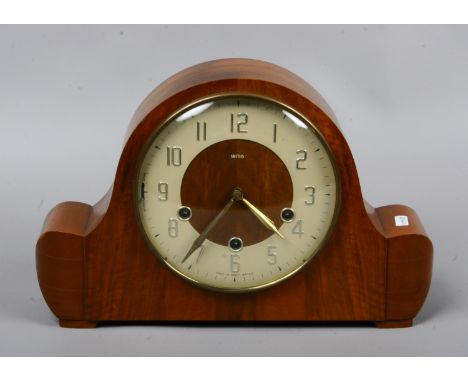 An Art Deco Smiths walnut cased mantel clock Westminster chiming (no key).