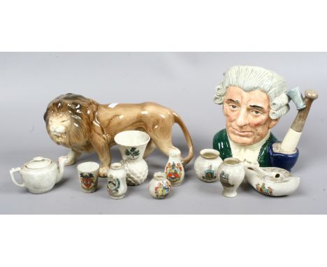 A Royal Doulton character jug apothecary, a Melba ware lion and quantity of crested china.