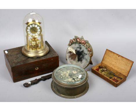 A mixed lot of collectable items, German torsion clock, barbola mirror, bulk head clock, African letter knife and a rosewood 