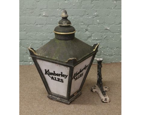 A vintage pub lantern for Kimberley Ales, with cast iron bracket.