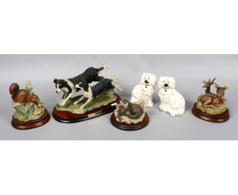 A collection of composite and ceramic models of animals to include Royal Doulton and Border Fine Arts.
