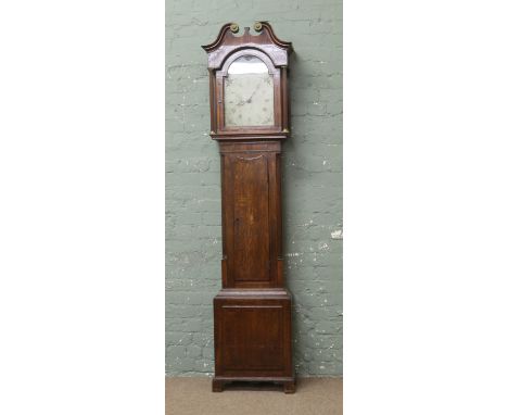 A Georgian thirty hour oak longcase clock with hand painted dial swan neck pediment and shell Patera inlay.