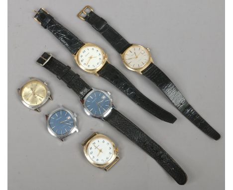 Six gents manual wristwatches including Lucerne and Phillips.
