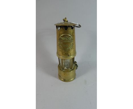 A Vintage Brass Miner's Safety Lamp by the Protector Lamp and Lighting Company 