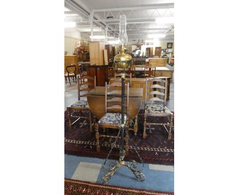 A Late 19th Century Wrought Iron Brass Mounted Adjustable Lamp Stand with Brass Oil Lamp 
