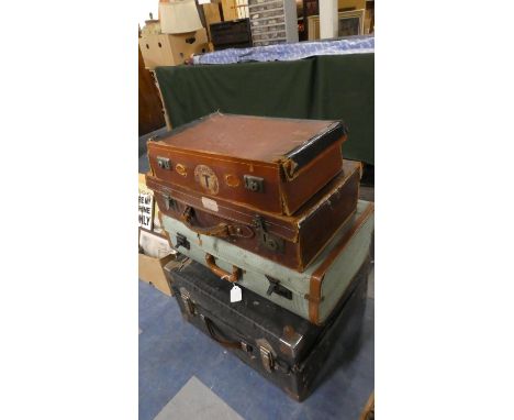 A Collection of Four Vintage Suitcases 