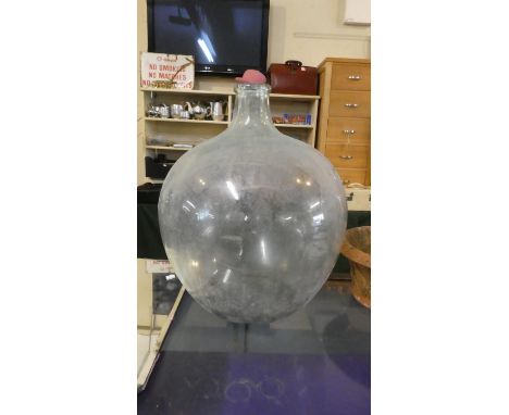 A Vintage Glass Car Boy, 55cm high 