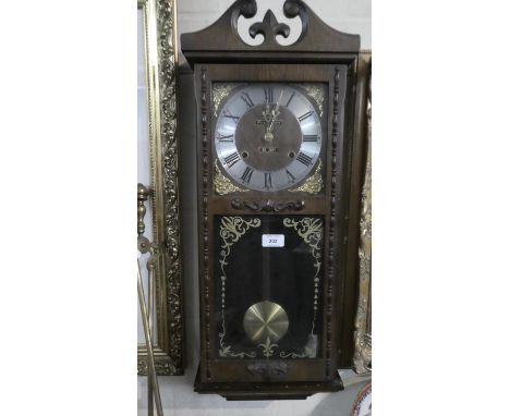 A Mid 20th Century President Wall Clock with 31 Day Movement, 72cm high 