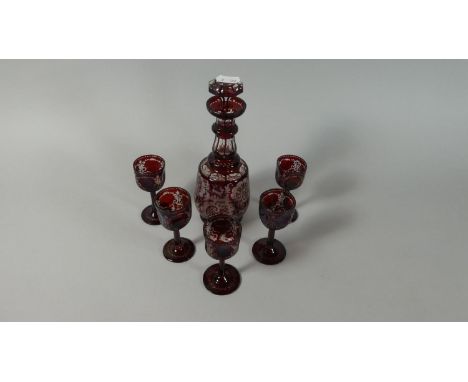 A Bohemian Overlaid Ruby Glass Liqueur Set Comprising Decanter and Five Liqueurs 