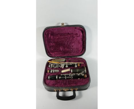 A Cased Czeslovakian Cor-ton Clarinet 