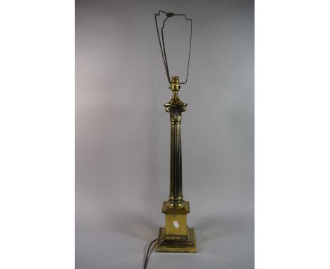 A Large Brass Table Lamp in the Form of a Reeded Corinthian Column on Stepped Plinth, Lamp 60cm High 