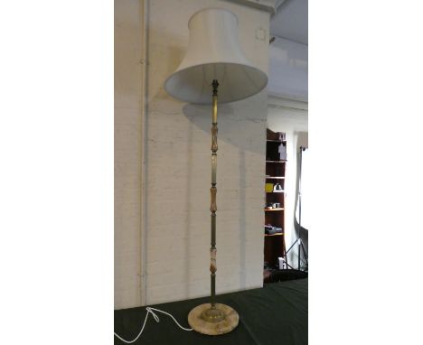 An Onyx and Brass Standard Lamp 