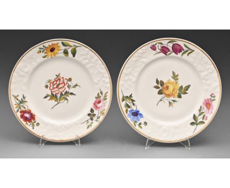 A pair of Chamberlain's Worcester moulded dessert plates, c1825, painted with four flowers and gilt, 22cm diam, impressed CHA