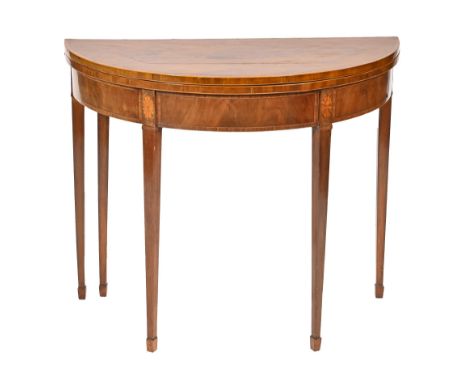 An inlaid mahogany card table,&nbsp;early 20th c, on square tapering legs, 74cm h; 91cm w Shrinkage cracks and scratches to t