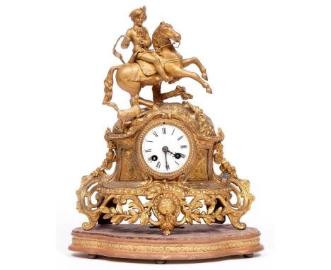 A French giltmetal equestrian figural mantle clock, late 19th c, 42cm h Enamel dial with hairline cracks, gilding rubbed in p