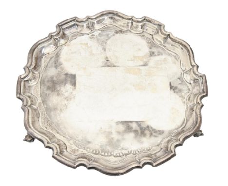 An Elizabeth II silver salver, on three volute feet, 30.5cm diam, by Viners Ltd, Sheffield 1958, 26ozs 12dwts Good condition,