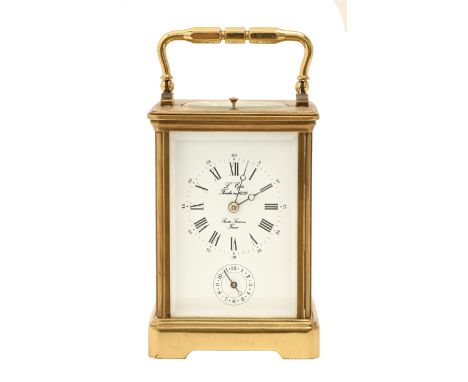 A French brass carriage clock, with platform escapement to the gong-striking movement, the dial inscribed L'epee Fondienen 18